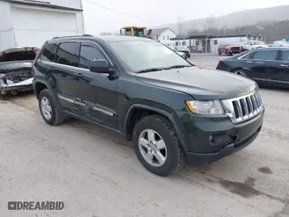 2011 Jeep Grand Cherokee Laredo with VIN 1J4RR4GG9BC546198, listed as a IAAI auction lot 41879387 with 190,973 mi miles. Bid and sale history available at carsss.com. Image 1.