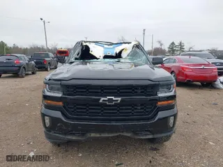 2016 Chevrolet Silverado 1500 LT with VIN 3GCUKREC6GG353660, listed as a IAAI auction lot 41240370 with 130,448 mi miles. Bid and sale history available at carsss.com. Image 6.