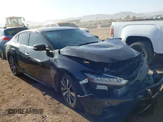 2019 Nissan Maxima Platinum z VIN 1N4AA6AV6KC362999, wystawiony jako IAAI lot #41537726 z przebiegiem 124 160 mil mil oraz . Historia ofert i sprzedaży dostępna na DreamBid. Obrazek 1.