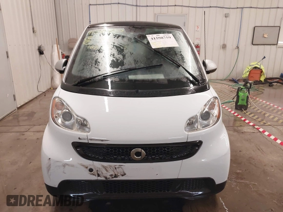 2015 Smart fortwo Passion z VIN WMEEJ3BA2FK790569, wystawiony jako IAAI lot #41598759 z przebiegiem 78 307 mil mil oraz . Historia ofert i sprzedaży dostępna na DreamBid. Obrazek 12.