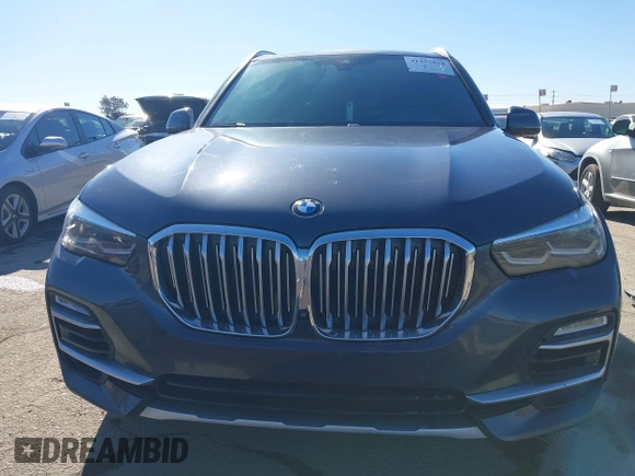 2021 BMW X5 sDrive40i with VIN 5UXCR4C08M9E15642, listed as a IAAI auction lot 41377524 with 76,050 mi miles. Bid and sale history available at carsss.com. Image 13.