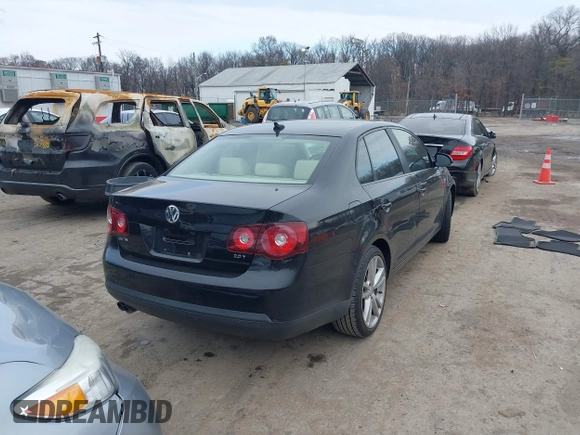 2010 Volkswagen Jetta Wolfsburg Edition with VIN 3VWRJ7AJ4AM075459, listed as a IAAI auction lot 41047857 with 131,871 mi miles and . Bid and sale history available at DreamBid. Image 4.