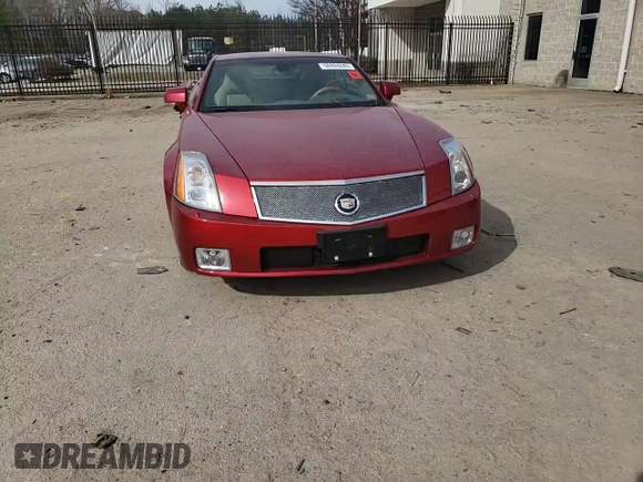 2004 Cadillac XLR z VIN 1G6YV34A045602305, wystawiony jako Copart lot #48484845 z przebiegiem 52 897 mil mil oraz Szkoda całkowita • Salvage title. Historia ofert i sprzedaży dostępna na DreamBid. Obrazek 11.