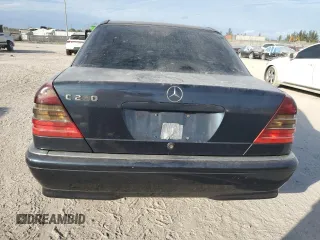 1998 Mercedes-Benz C 230/260/280/320 with VIN WDBHA23G8WA637787, listed as a Copart auction lot 88411815 with 207,843 mi miles and Salvage Title. Bid and sale history available at carsss.com. Image 6.