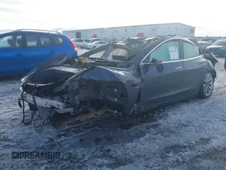 2020 Tesla Model 3 Long Range z VIN 5YJ3E1EB9LF787390, wystawiony jako IAAI lot #41614394 z przebiegiem Nie podano mil oraz . Historia ofert i sprzedaży dostępna na DreamBid. Obrazek 16.