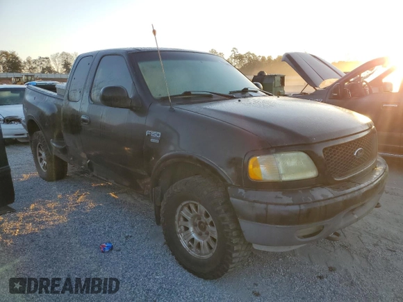 2002 Ford F-150 XL with VIN 2FTRX08L72CA44252, listed as a Copart auction lot 77344214 with 255,001 mi miles and Clean title. Bid and sale history available at DreamBid. Image 4.