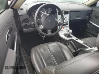 2005 Chrysler Crossfire z VIN 1C3AN59L95X032917, wystawiony jako Copart lot #75003614 z przebiegiem Nie podano mil oraz Szkody całkowita. Historia ofert i sprzedaży dostępna na DreamBid. Obrazek 8.