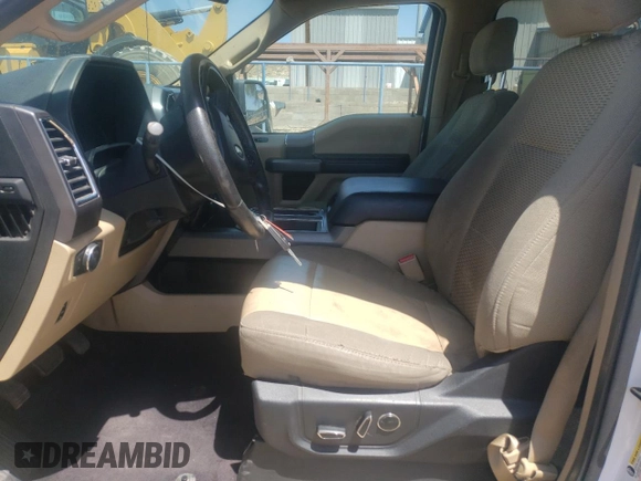 2016 Ford F-150 XLT with VIN 1FTEW1EG9GKD10971, listed as a Copart auction lot 60903055 with 158,993 mi miles and Salvage title. Bid and sale history available at DreamBid. Image 7.