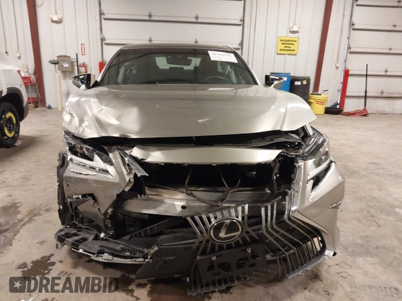 2021 Lexus ES 250 z VIN 58AD11D11MU007968, wystawiony jako IAAI lot #41968246 z przebiegiem 11 522 mil mil oraz . Historia ofert i sprzedaży dostępna na DreamBid. Obrazek 13.