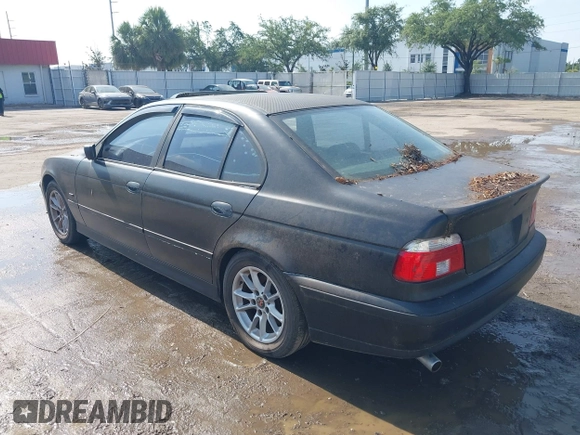 2000 BMW 5 Series 528i z VIN WBADM6348YGU16191, wystawiony jako IAAI lot #42295709 z przebiegiem 208 067 mil mil oraz . Historia ofert i sprzedaży dostępna na DreamBid. Obrazek 3.