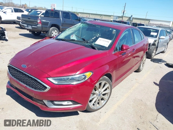 2017 Ford Fusion Titanium with VIN 3FA6P0K90HR184777, listed as a IAAI auction lot 41722188 with 116,654 mi miles. Bid and sale history available at carsss.com. Image 2.