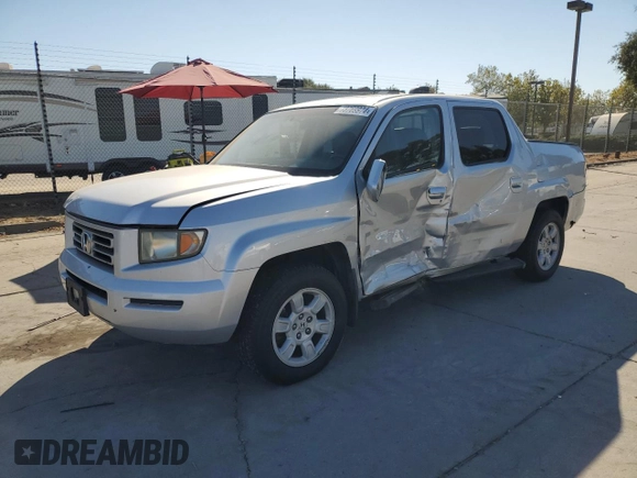 2007 Honda Ridgeline RTL w/Leather with VIN 2HJYK16567H539309, listed as a Copart auction lot 73769974 with 173,499 mi miles and Salvage Title. Bid and sale history available at carsss.com. Image 1.