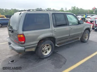 2000 Mercury Mountaineer with VIN 4M2ZU86P8YUJ07066, listed as a IAAI auction lot 42114617 with 233,146 mi miles. Bid and sale history available at carsss.com. Image 4.