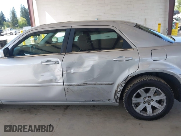 2005 Chrysler 300 Touring with VIN 2C3JA53G75H687752, listed as a IAAI auction lot 42190758 with 170,269 mi miles and . Bid and sale history available at DreamBid. Image 6.