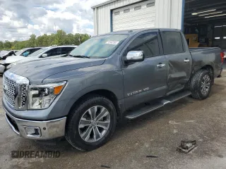 2019 Nissan Titan SV with VIN 1N6AA1E61KN529707, listed as a Copart auction lot 74140184 with 97,510 mi miles and Salvage title. Bid and sale history available at DreamBid. Image 1.