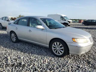 2006 Hyundai Azera SE with VIN KMHFC46F96A037972, listed as a Copart auction lot 61035765 with 140,857 mi miles and Salvage title. Bid and sale history available at DreamBid. Image 4.