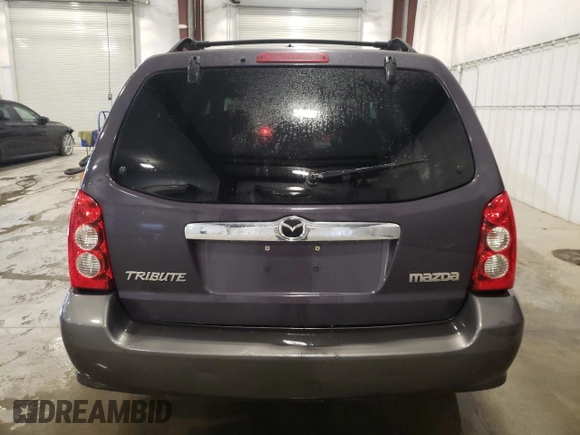 2005 Mazda Tribute i with VIN 4F2YZ92Z35KM49077, listed as a Copart auction lot 55406204 with 110,959 mi miles and Non Repairable. Bid and sale history available at carsss.com. Image 6.