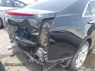 2013 Cadillac ATS z VIN 1G6AA5RA1D0179071, wystawiony jako IAAI lot #42438437 z przebiegiem 97 558 mil mil oraz . Historia ofert i sprzedaży dostępna na DreamBid. Obrazek 6.