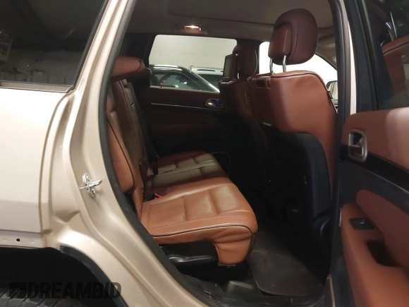 2015 Jeep Grand Cherokee Summit with VIN 1C4RJFJG5FC918837, listed as a IAAI auction lot 41126436 with 155,516 mi miles. Bid and sale history available at carsss.com. Image 8.