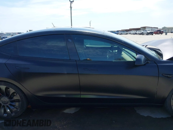 2022 Tesla Model 3 Performance with VIN 5YJ3E1EC6NF104475, listed as a IAAI auction lot 41734724 with 31,717 mi miles and . Bid and sale history available at carsss.com. Image 13.