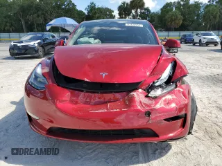 2024 Tesla Model Y Long Range с VIN 7SAYGDEE4RA325145, выставлен на аукционе Copart как лот 61132955 с пробегом 16 659 миль миль и Списание • Salvage title. История ставок и продаж доступна на DreamBid. Изображение 5.