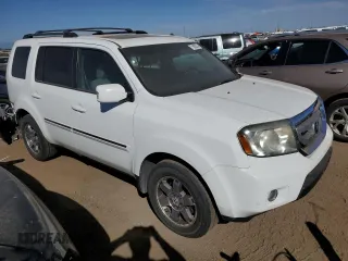 2010 Honda Pilot Touring with VIN 5FNYF3H82AB022596, listed as a Copart auction lot 71893214 with 131,901 mi miles and Salvage Title. Bid and sale history available at DreamBid. Image 4.
