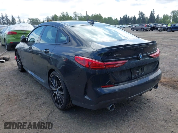 2020 BMW 2 Series 228i xDrive with VIN WBA73AK00L7F77132, listed as a IAAI auction lot 42129698 with 27,989 mi miles and . Bid and sale history available at DreamBid. Image 3.