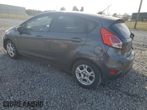 2015 Ford Fiesta SE z VIN 3FADP4EJ0FM108474, wystawiony jako Copart lot #78352184 z przebiegiem 160 583 mil mil oraz Szkoda całkowita • Salvage title. Historia ofert i sprzedaży dostępna na DreamBid. Obrazek 2.