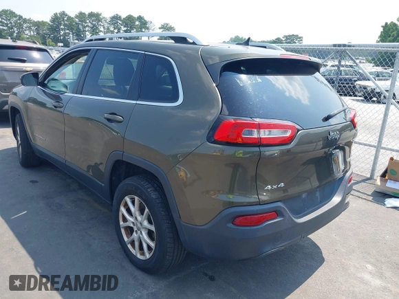 2015 Jeep Cherokee Latitude z VIN 1C4PJMCS9FW551694, wystawiony jako IAAI lot #42424992 z przebiegiem 125 852 mil mil oraz . Historia ofert i sprzedaży dostępna na DreamBid. Obrazek 3.