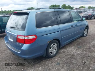 2005 Honda Odyssey EX-L z VIN 5FNRL38755B126414, wystawiony jako IAAI lot #42327946 z przebiegiem 340 043 mil mil oraz . Historia ofert i sprzedaży dostępna na DreamBid. Obrazek 4.