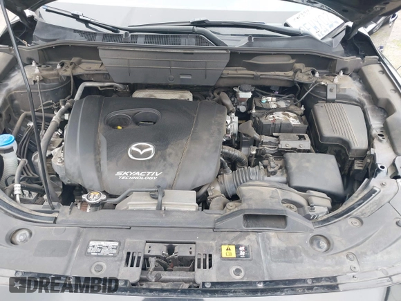 2018 Mazda CX-5 Grand Touring with VIN JM3KFADM4J0326760, listed as a IAAI auction lot 41885100 with 82,091 mi miles and . Bid and sale history available at DreamBid. Image 10.