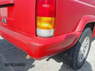 1997 Jeep Cherokee Country with VIN 1J4FJ78S9VL591872, listed as a IAAI auction lot 41830794 with 191,074 mi miles. Bid and sale history available at carsss.com. Image 12.