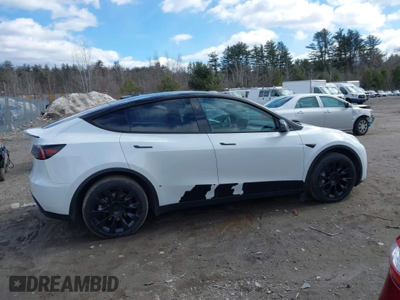 2023 Tesla Model Y Long Range with VIN 7SAYGDEE7PF832007, listed as a IAAI auction lot 41751598 with 14,126 mi miles and . Bid and sale history available at DreamBid. Image 13.