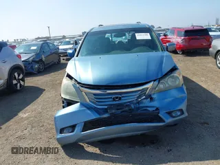 2010 Honda Odyssey Touring with VIN 5FNRL3H92AB056186, listed as a IAAI auction lot 41851386 with 199,109 mi miles. Bid and sale history available at carsss.com. Image 12.
