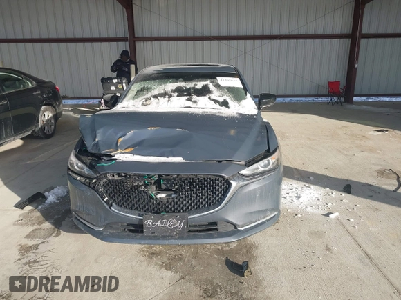 2021 Mazda 6 Carbon Edition with VIN JM1GL1WY6M1616617, listed as a IAAI auction lot 41365615 with 60,747 mi miles and . Bid and sale history available at DreamBid. Image 12.