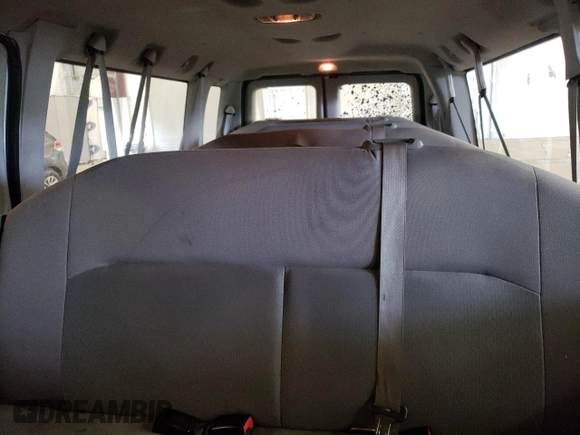 2014 Ford Econoline Passenger XL z VIN 1FBSS3BL1EDA50437, wystawiony jako Copart lot #48759795 z przebiegiem 538 501 mil mil oraz Nie do naprawy. Historia ofert i sprzedaży dostępna na DreamBid. Obrazek 10.