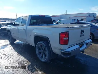 2019 GMC Sierra 1500 Limited SLE with VIN 2GTV2MEC8K1237210, listed as a IAAI auction lot 41354434 with 164,999 mi miles. Bid and sale history available at carsss.com. Image 3.