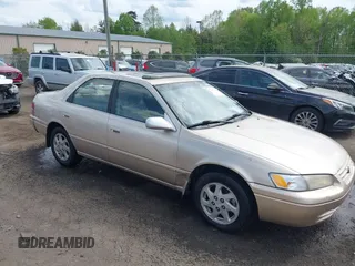 1999 Toyota Camry LE z VIN JT2BF28K9X0166819, wystawiony jako IAAI lot #42035923 z przebiegiem 318 929 mil mil oraz . Historia ofert i sprzedaży dostępna na DreamBid. Obrazek 1.