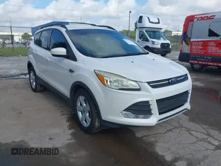 2014 Ford Escape SE with VIN 1FMCU0GX2EUA02753, listed as a IAAI auction lot 42191334 with 205,289 mi miles. Bid and sale history available at carsss.com. Image 1.