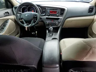 2013 Kia Optima LX z VIN 5XXGM4A74DG102024, wystawiony jako Copart lot #58264275 z przebiegiem 128 594 mil mil oraz Szkoda całkowita • Salvage title. Historia ofert i sprzedaży dostępna na DreamBid. Obrazek 8.