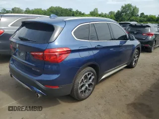2021 BMW X1 xDrive28i with VIN WBXJG9C0XM5U47141, listed as a Copart auction lot 60645865 with 56,106 mi miles and Salvage title. Bid and sale history available at DreamBid. Image 3.