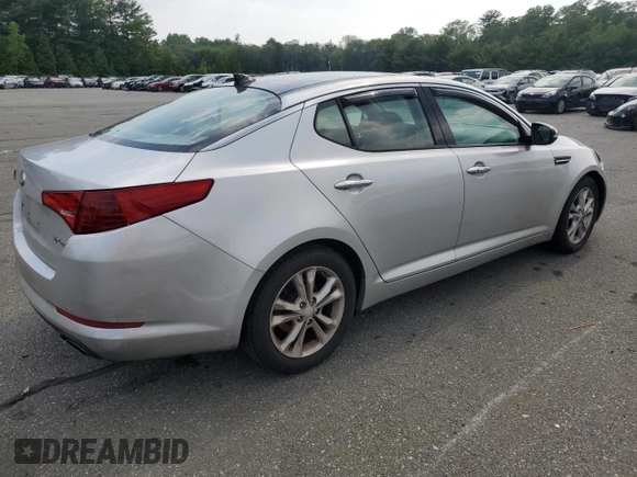 2013 Kia Optima EX z VIN 5XXGN4A79DG217554, wystawiony jako Copart lot #59667065 z przebiegiem 102 482 mil mil oraz Szkoda całkowita • Salvage title. Historia ofert i sprzedaży dostępna na DreamBid. Obrazek 3.
