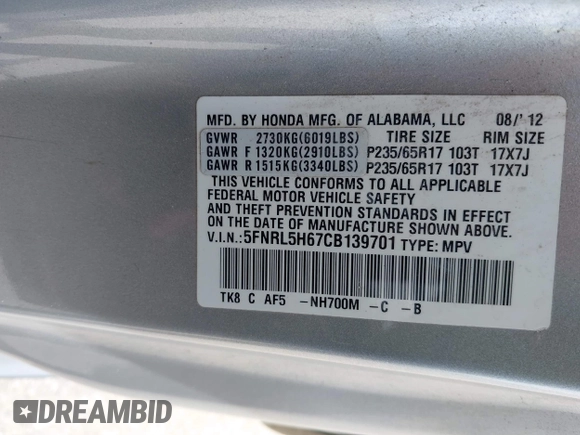 2012 Honda Odyssey EX-L with VIN 5FNRL5H67CB139701, listed as a IAAI auction lot 42233283 with 147,143 mi miles and . Bid and sale history available at DreamBid. Image 9.