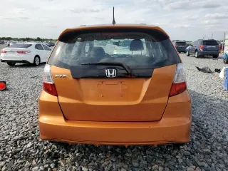 2011 Honda Fit Sport with VIN JHMGE8H59BC007883, listed as a Copart auction lot 54194635 with 123,256 mi miles and Salvage Title. Bid and sale history available at DreamBid. Image 6.