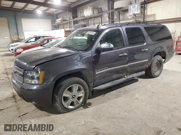 2010 Chevrolet Suburban LTZ with VIN 1GNUKKE3XAR244933, listed as a Copart auction lot 85247514 with 200,732 mi miles and Salvage Title. Bid and sale history available at carsss.com. Image 1.