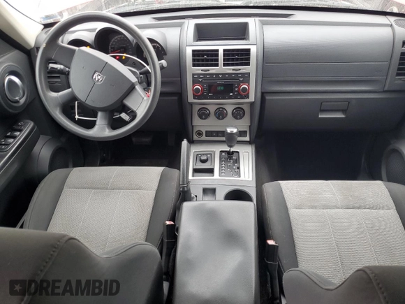 2007 Dodge Nitro SXT with VIN 1D8GU28K57W662816, listed as a Copart auction lot 56965655 with 182,614 mi miles and Salvage title. Bid and sale history available at DreamBid. Image 8.