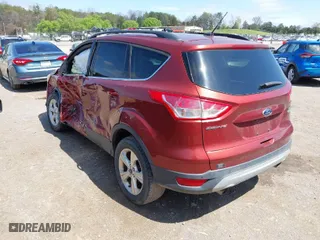 2014 Ford Escape SE with VIN 1FMCU0GX0EUB54675, listed as a IAAI auction lot 41865057 with 145,632 mi miles. Bid and sale history available at carsss.com. Image 3.