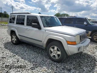 2009 Jeep Commander Sport with VIN 1J8HH48K89C540189, listed as a Copart auction lot 52552235 with 258,377 mi miles and Salvage title. Bid and sale history available at DreamBid. Image 4.