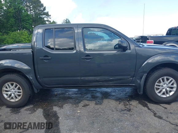 2015 Nissan Frontier SV with VIN 1N6AD0EV6FN751948, listed as a IAAI auction lot 42063935 with 52,244 mi miles and . Bid and sale history available at DreamBid. Image 13.