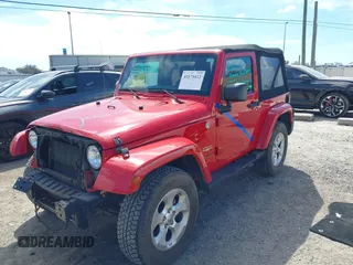 2014 Jeep Wrangler Sahara with VIN 1C4AJWBG0EL109773, listed as a IAAI auction lot 41678412 with 12,264 mi miles and . Bid and sale history available at DreamBid. Image 19.